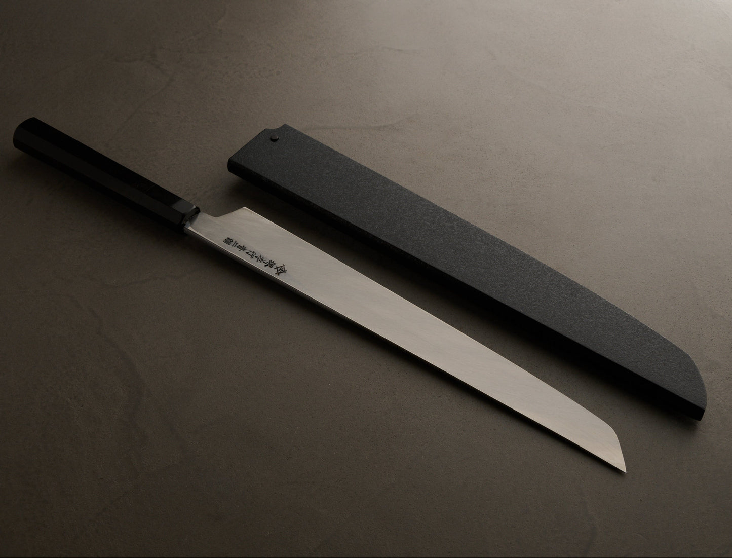 Sakai Takayuki | Blue Mirror | Rounded Tip, Genbu Style | Black Stone-Grain Lacquered Sheath (with Pin) | 300mm